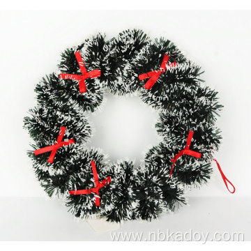 Christmas bows decorate the wreath